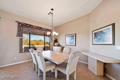 This beautifully maintained residence, located in a desirable on Trilogy Golf Club At Power Ranch in Arizona - for sale on GolfHomes.com, golf home, golf lot
