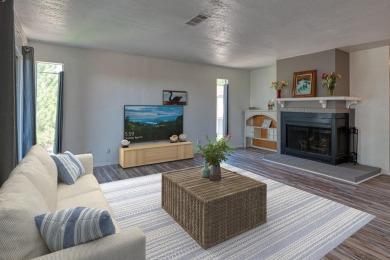 Complete with a Stair Lift to the main living space. Open floor on Arroyo Del Oso Golf Course in New Mexico - for sale on GolfHomes.com, golf home, golf lot