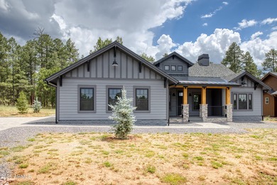 This stunning single-story custom farmhouse-style home, built in on Torreon Golf Club in Arizona - for sale on GolfHomes.com, golf home, golf lot