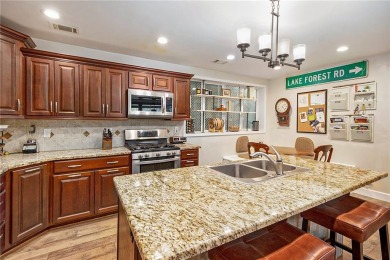 Just LOOK at this Remodeled Lake Front Home!  So much work has on Lake of the Forest Golf Course in Kansas - for sale on GolfHomes.com, golf home, golf lot