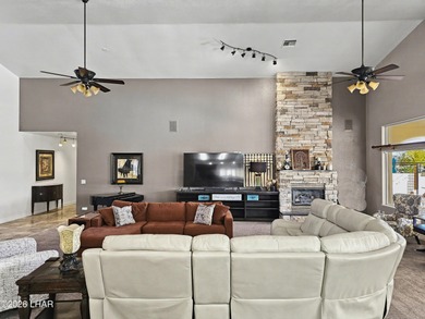 Experience golf course living at its finest in this beautifully on Cerbat Cliffs Golf Course in Arizona - for sale on GolfHomes.com, golf home, golf lot