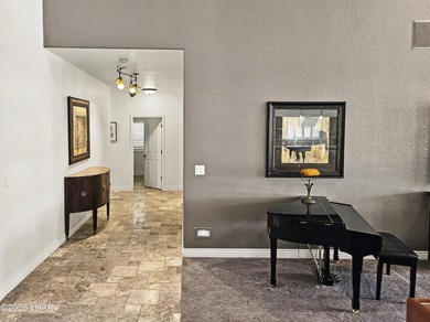 Experience golf course living at its finest in this beautifully on Cerbat Cliffs Golf Course in Arizona - for sale on GolfHomes.com, golf home, golf lot