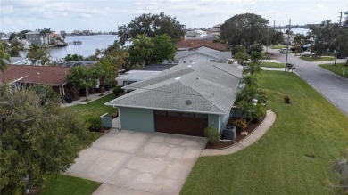 Hot off the presses!  Brand new roof (05/2024) and Upgraded on The Tides Golf Club in Florida - for sale on GolfHomes.com, golf home, golf lot