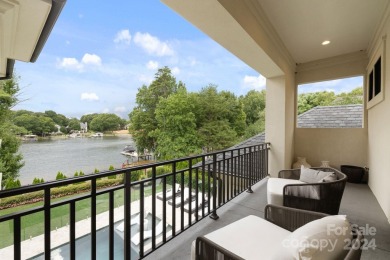 Nestled along the pristine shores of Lake Norman, this on The Peninsula Club in North Carolina - for sale on GolfHomes.com, golf home, golf lot