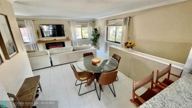 Experience breathtaking views from this spacious corner unit at on Jacaranda Golf Club in Florida - for sale on GolfHomes.com, golf home, golf lot