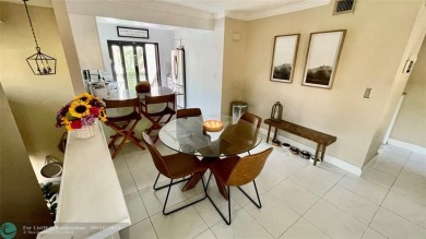 Experience breathtaking views from this spacious corner unit at on Jacaranda Golf Club in Florida - for sale on GolfHomes.com, golf home, golf lot