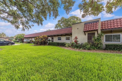 Turn-key 2 BR 2 BA condo in Pinehurst Village. 55+ one-story on The Dunedin Country Club in Florida - for sale on GolfHomes.com, golf home, golf lot