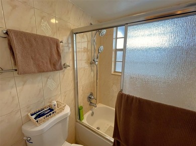 WONDERFUL 1 BEDROOM 1 BATHROOM CONDO IN DESIREABLE COMMUNITY OF on Oriole Golf and Tennis Club in Florida - for sale on GolfHomes.com, golf home, golf lot