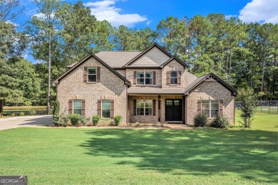 Discover this stunning Craftsman-style home featuring 4 bedrooms on Canongate At Georgia National Golf Club in Georgia - for sale on GolfHomes.com, golf home, golf lot