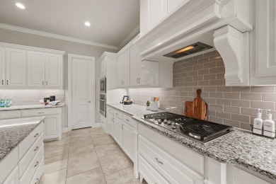Welcome to this immaculate former model home, nestled on a on The Golf Club at Resort Eagle Mountain Lake in Texas - for sale on GolfHomes.com, golf home, golf lot
