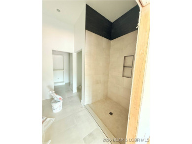 BRAND NEW CONSTRUCTION located on the 3 Mile Marker of Horseshoe on Seasons Ridge At Four Seasons in Missouri - for sale on GolfHomes.com, golf home, golf lot