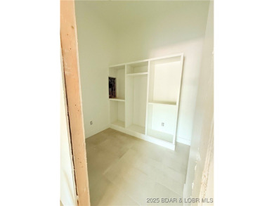 BRAND NEW CONSTRUCTION located on the 3 Mile Marker of Horseshoe on Seasons Ridge At Four Seasons in Missouri - for sale on GolfHomes.com, golf home, golf lot