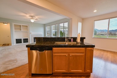 Welcome to this spacious 4-bedroom, 3-bath, 2,615 sq ft home on Dayton Valley Golf Club At Legado in Nevada - for sale on GolfHomes.com, golf home, golf lot