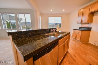 Welcome to this spacious 4-bedroom, 3-bath, 2,615 sq ft home on Dayton Valley Golf Club At Legado in Nevada - for sale on GolfHomes.com, golf home, golf lot