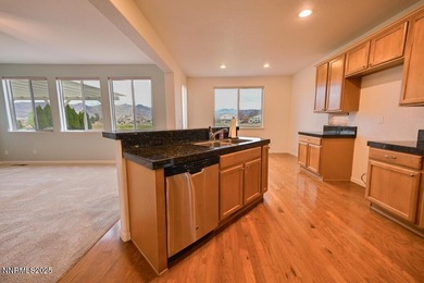 Welcome to this spacious 4-bedroom, 3-bath, 2,615 sq ft home on Dayton Valley Golf Club At Legado in Nevada - for sale on GolfHomes.com, golf home, golf lot