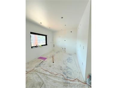 BRAND NEW CONSTRUCTION located on the 3 Mile Marker of Horseshoe on Seasons Ridge At Four Seasons in Missouri - for sale on GolfHomes.com, golf home, golf lot