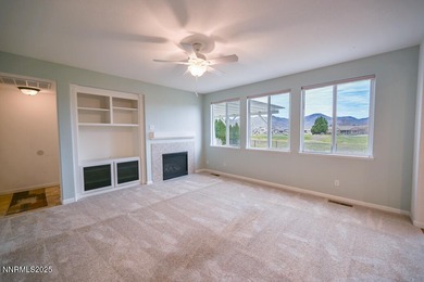 Welcome to this spacious 4-bedroom, 3-bath, 2,615 sq ft home on Dayton Valley Golf Club At Legado in Nevada - for sale on GolfHomes.com, golf home, golf lot