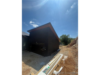 BRAND NEW CONSTRUCTION located on the 3 Mile Marker of Horseshoe on Seasons Ridge At Four Seasons in Missouri - for sale on GolfHomes.com, golf home, golf lot
