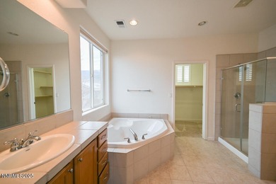 Welcome to this spacious 4-bedroom, 3-bath, 2,615 sq ft home on Dayton Valley Golf Club At Legado in Nevada - for sale on GolfHomes.com, golf home, golf lot