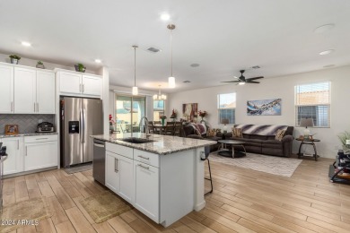 Discover this stunning home in the vibrant community of Verrado on Verrado Golf Club - Victory in Arizona - for sale on GolfHomes.com, golf home, golf lot