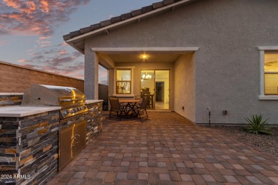 Discover this stunning home in the vibrant community of Verrado on Verrado Golf Club - Victory in Arizona - for sale on GolfHomes.com, golf home, golf lot