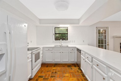 This charming 3 bed/2 bath Lake Forest cottage on a spacious on Lake Forest Yacht and Country Club in Alabama - for sale on GolfHomes.com, golf home, golf lot