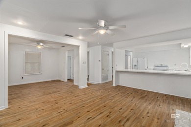 This charming 3 bed/2 bath Lake Forest cottage on a spacious on Lake Forest Yacht and Country Club in Alabama - for sale on GolfHomes.com, golf home, golf lot