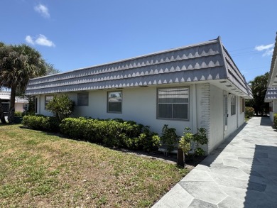 Step into this beautifully reimagined villa, where every detail on Kings Point Golf - Executive in Florida - for sale on GolfHomes.com, golf home, golf lot
