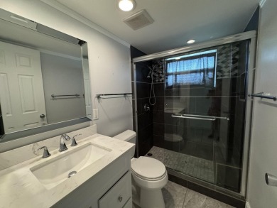 Step into this beautifully reimagined villa, where every detail on Kings Point Golf - Executive in Florida - for sale on GolfHomes.com, golf home, golf lot