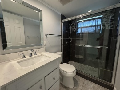 Step into this beautifully reimagined villa, where every detail on Kings Point Golf - Executive in Florida - for sale on GolfHomes.com, golf home, golf lot