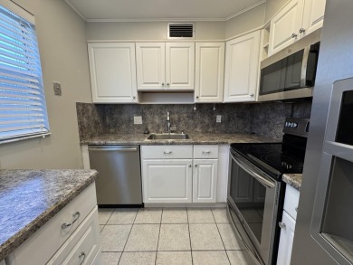 Step into this beautifully reimagined villa, where every detail on Kings Point Golf - Executive in Florida - for sale on GolfHomes.com, golf home, golf lot