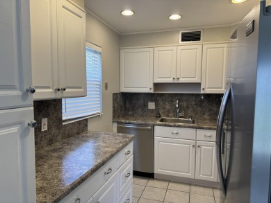 Step into this beautifully reimagined villa, where every detail on Kings Point Golf - Executive in Florida - for sale on GolfHomes.com, golf home, golf lot