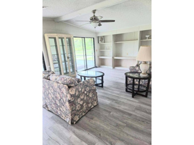Welcome to your serene sanctuary nestled on an exterior lot of on Lake Henry Golf Club in Florida - for sale on GolfHomes.com, golf home, golf lot