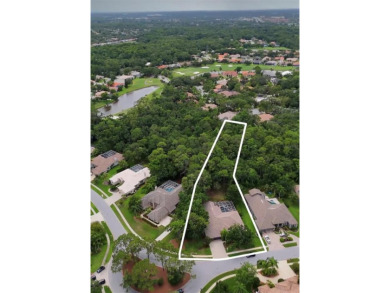 Under contract-accepting backup offers. Exquisite Luxury Retreat on Tarpon Woods Golf Club in Florida - for sale on GolfHomes.com, golf home, golf lot