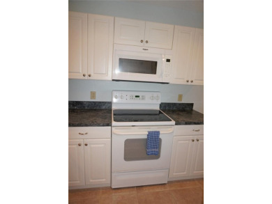 GROUND FLOOR ** TURNKEY FURNISHED** END UNIT with fabulous GOLF on Deep Creek Golf Club in Florida - for sale on GolfHomes.com, golf home, golf lot