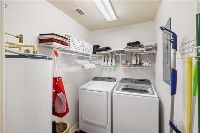 Move-In Ready 2BR/2BA Condo with Bonus Room, Garage  Water View on Bird Bay Executive Golf Club in Florida - for sale on GolfHomes.com, golf home, golf lot
