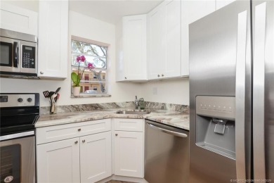 Ground floor one bedroom, one bathroom beautifully updated condo on Monterey Yacht and Country Club in Florida - for sale on GolfHomes.com, golf home, golf lot