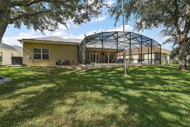 Up To Date Pool Home with Golf Course Views. Roof 2022, AC 2023 on Plantation Golf Club in Florida - for sale on GolfHomes.com, golf home, golf lot