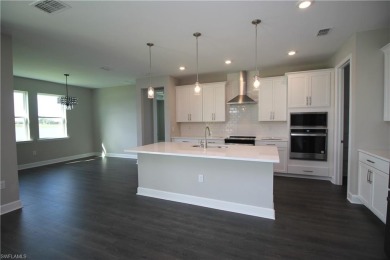 Gorgeous newer home in Valencia Lakes bult in 2022.  Available on Valencia Golf and Country Club in Florida - for sale on GolfHomes.com, golf home, golf lot