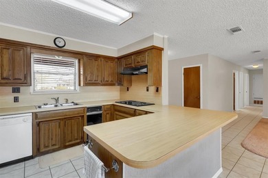 Location, location, location.  This 3 bedroom, 2 bath home with on Lake Kiowa Golf Course in Texas - for sale on GolfHomes.com, golf home, golf lot