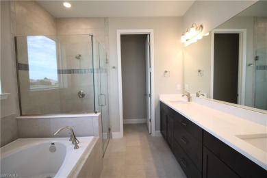 Gorgeous newer home in Valencia Lakes bult in 2022.  Available on Valencia Golf and Country Club in Florida - for sale on GolfHomes.com, golf home, golf lot