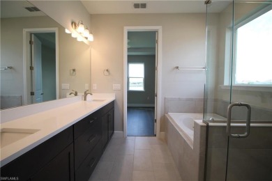 Gorgeous newer home in Valencia Lakes bult in 2022.  Available on Valencia Golf and Country Club in Florida - for sale on GolfHomes.com, golf home, golf lot