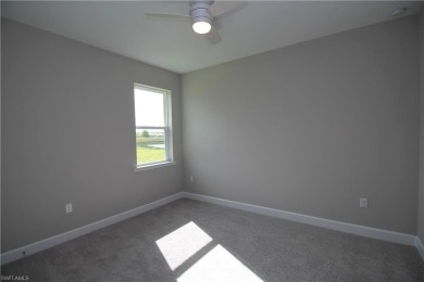 Gorgeous newer home in Valencia Lakes bult in 2022.  Available on Valencia Golf and Country Club in Florida - for sale on GolfHomes.com, golf home, golf lot