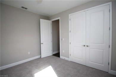 Gorgeous newer home in Valencia Lakes bult in 2022.  Available on Valencia Golf and Country Club in Florida - for sale on GolfHomes.com, golf home, golf lot