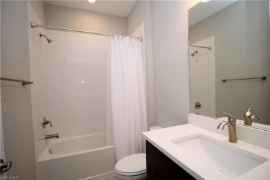 Gorgeous newer home in Valencia Lakes bult in 2022.  Available on Valencia Golf and Country Club in Florida - for sale on GolfHomes.com, golf home, golf lot