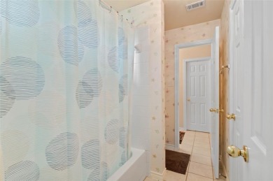 Beautiful 2 story brick home with 3 car garage on the 15th hole on Oakmont Country Club in Texas - for sale on GolfHomes.com, golf home, golf lot