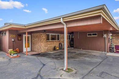 Enjoy low-maintenance golf course living on the 9th green of the on Tri-City Country Club in Washington - for sale on GolfHomes.com, golf home, golf lot