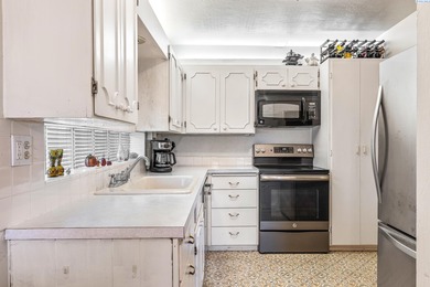 Enjoy low-maintenance golf course living on the 9th green of the on Tri-City Country Club in Washington - for sale on GolfHomes.com, golf home, golf lot