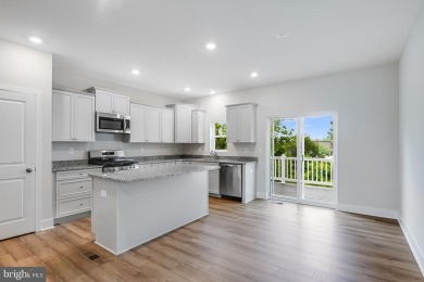READY NOW!  END UNIT BAYLOR WITH DECK & 3RD BATHROOM!  Move in on Plantation Lakes Golf and Country Club in Delaware - for sale on GolfHomes.com, golf home, golf lot