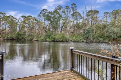 A rare gem in Heritage Lakes! This Tudor-style home sits on on Hilton Head National Golf Club in South Carolina - for sale on GolfHomes.com, golf home, golf lot